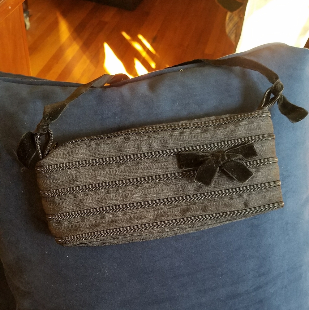 Conversation piece black purse made of zippers!